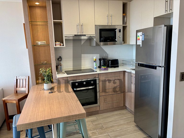 Depto em edifício moderno em Edmundo Eluchans