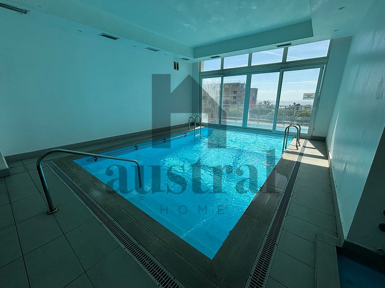 Amplio con vista al mar y piscina climatizada